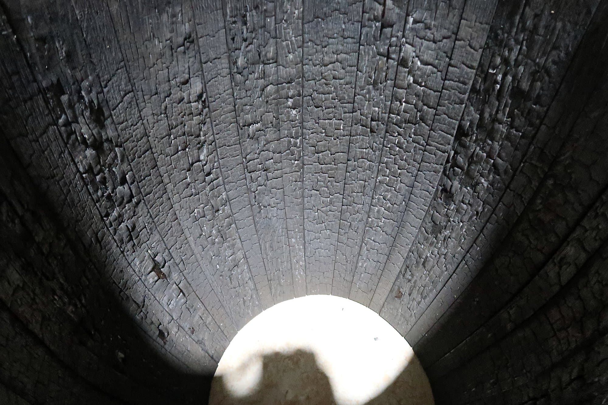 Alligator char texture inside an oak barrel at Standard Cooperage