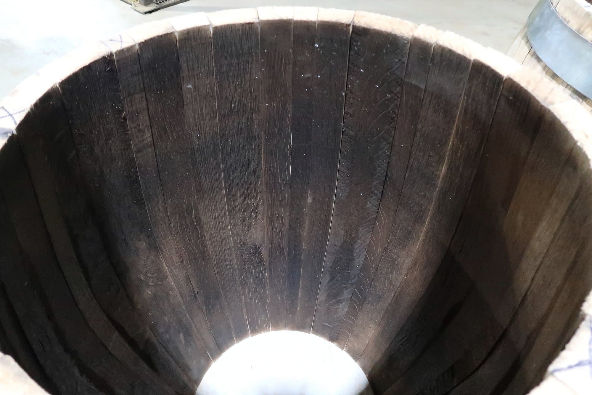 Toasted oak stave interior of a barrel at Standard Cooperage