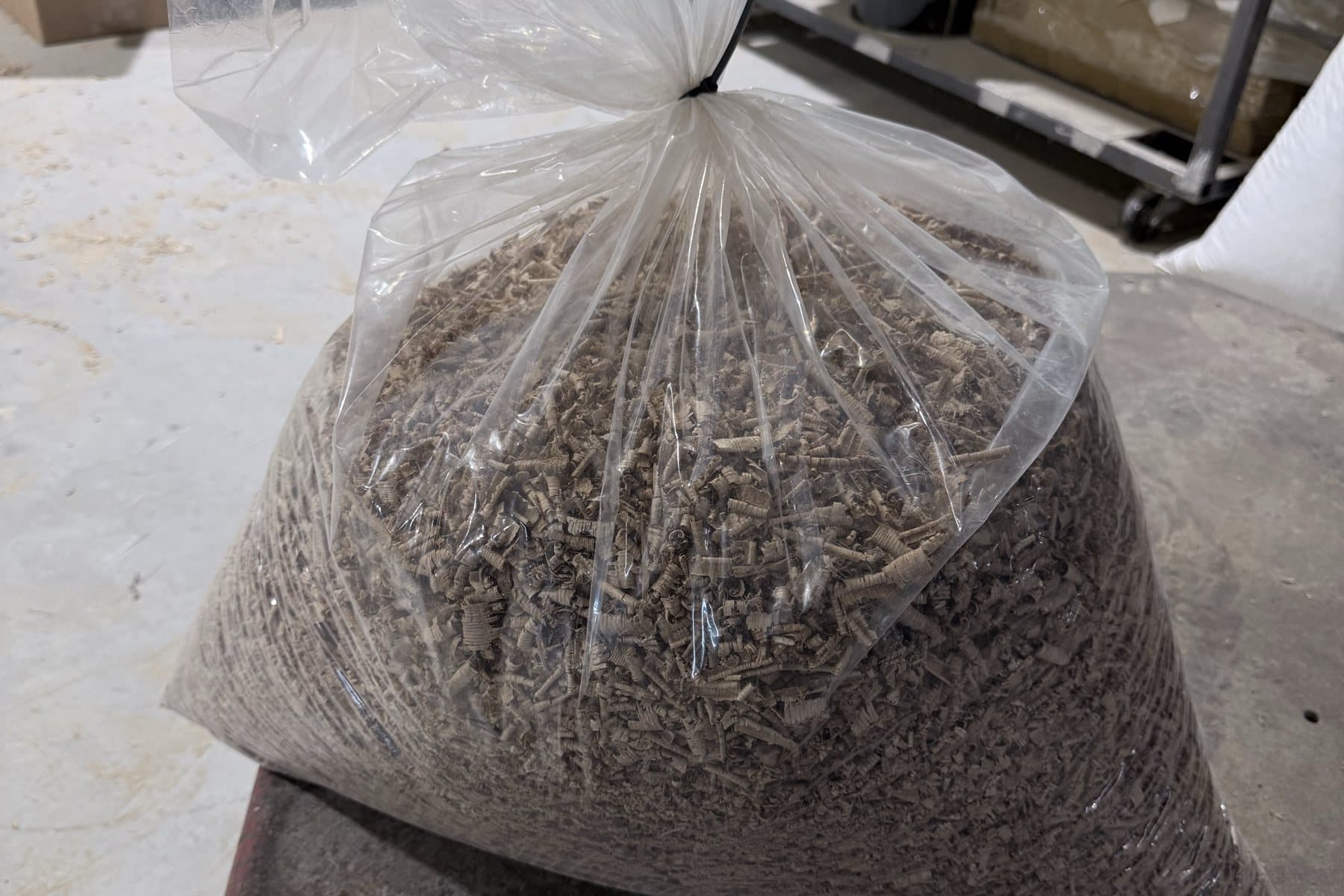 Bag of oak chip shavings prepared at Standard Cooperage