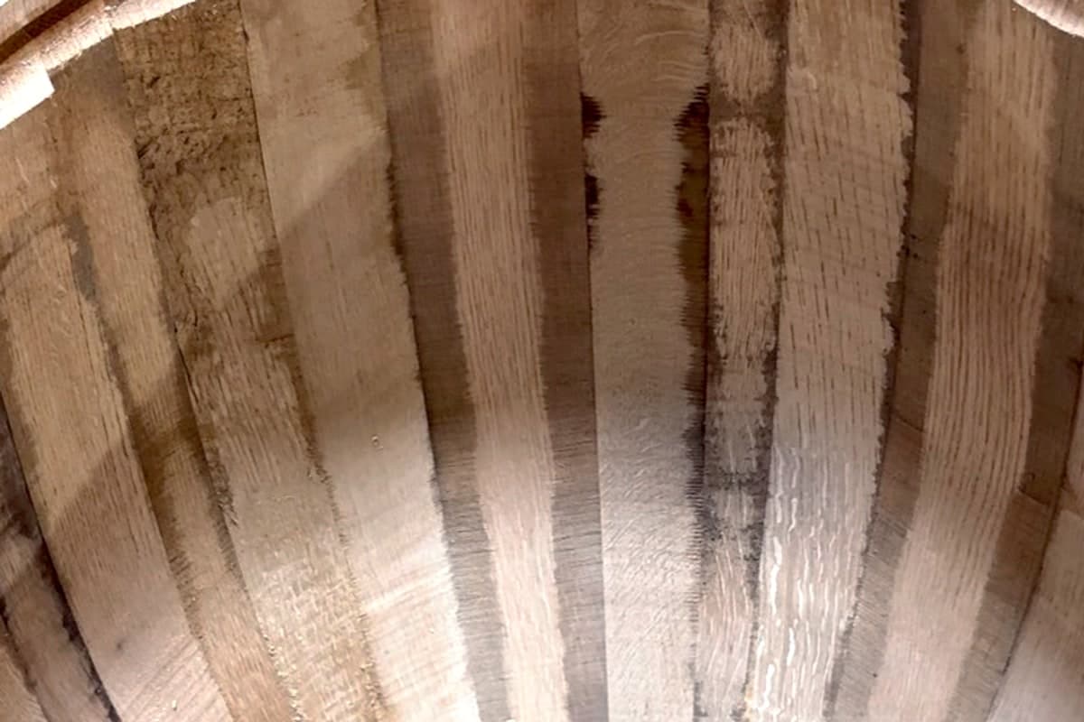Light Toast oak barrel interior at Standard Cooperage, showing the grain and toast color of the staves